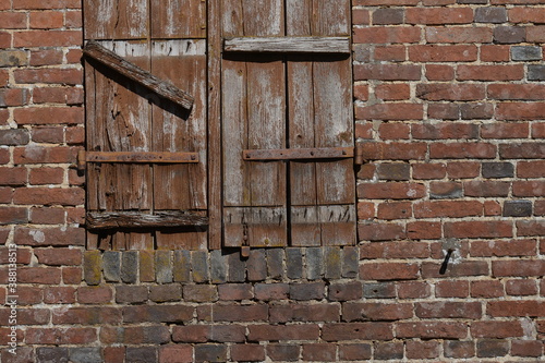 old brick wall with windows