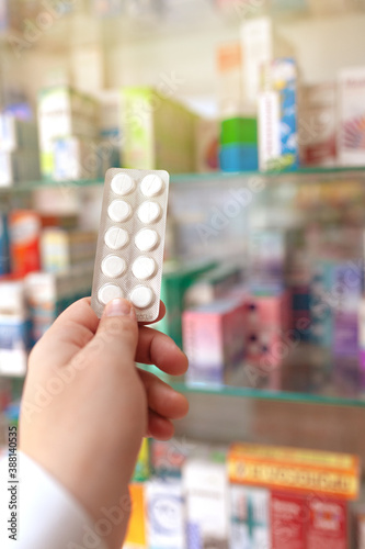 PHARMACIST KEEPING MEDICINES