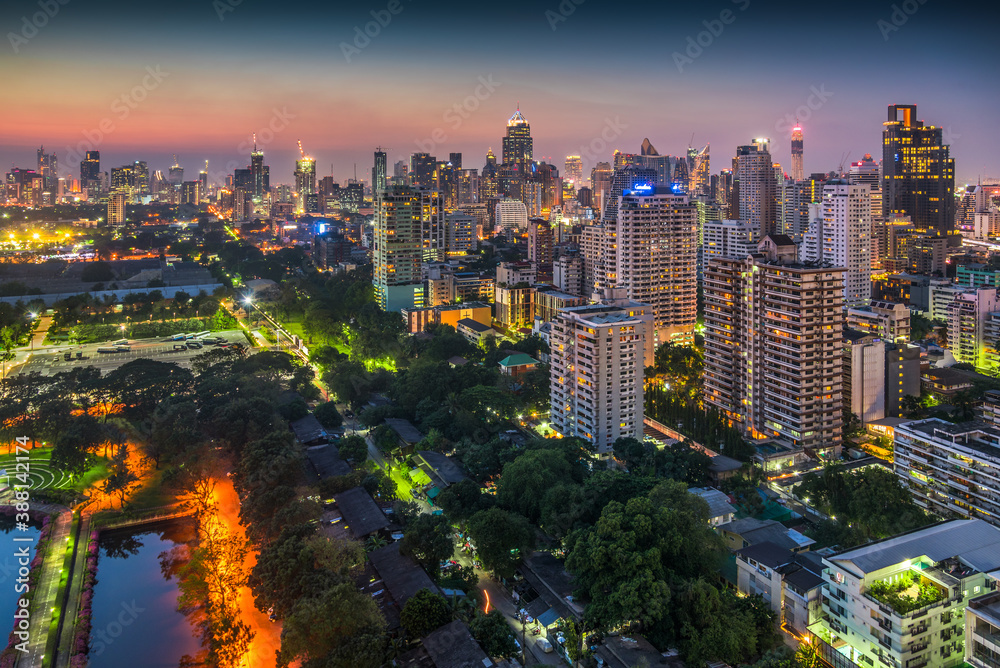 Panoramic View of Bangkok, Thailand. Cityscape with Public Park and Skyscrapers at Twilight.
