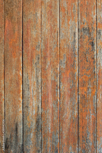 The texture of the fence from wooden old boards. Peeling paint of an old fence © Lidia_Lo