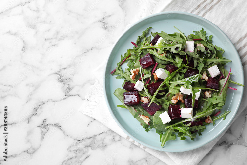 Fresh delicious beet salad on white marble table, top view. Space for text - obrazy, fototapety, plakaty 