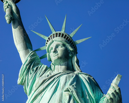 USA, New York, New York City, Statue of Liberty against blue sky photo
