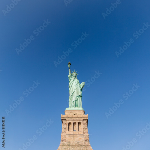 USA, New York, New York City, Statue of Liberty against blue sky