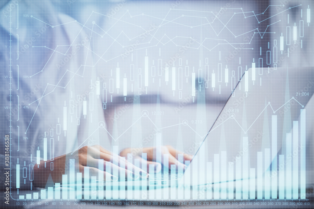 Double exposure of woman hands working on computer and forex graph hologram drawing. Financial analysis concept. Double exposure of woman hands working on computer and forex graph hologram drawing. Financial analysis concept.