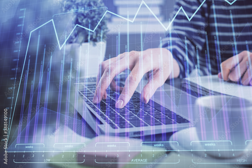 Double exposure of woman hands typing on computer and forex chart hologram drawing. Stock market invest concept. Double exposure of woman hands typing on computer and forex chart hologram drawing. Stock market invest concept.