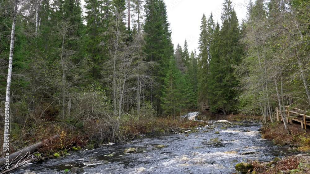 Cascade waterfalls in karelian forest. Autumn nature