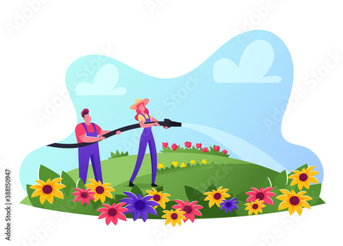 People Care of Flowers on Field, Outdoor Seasonal Activity. Male and Female Gardeners Wear Overalls Watering Plants