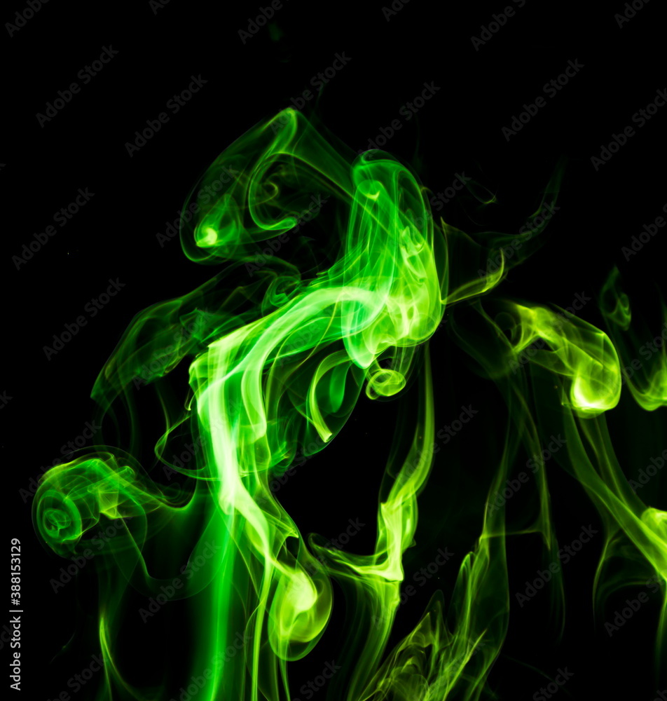 Green smoke on black background Green smoke on black background