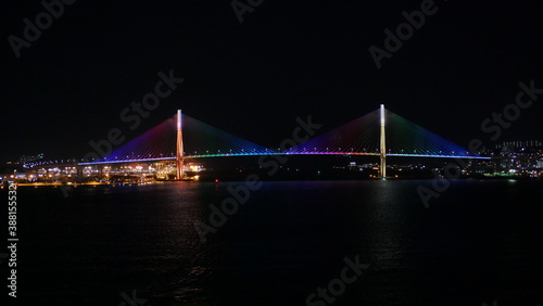 night shot of Korea busan bridge and port from cruise 