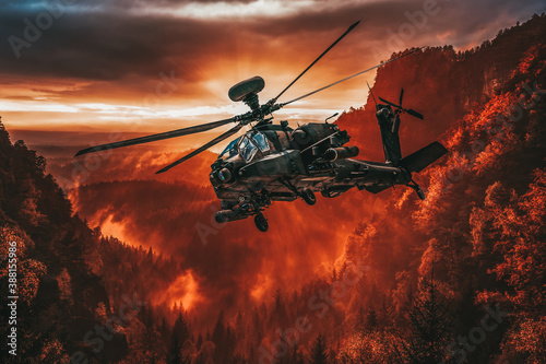 American attack helicopter flies over a beautiful landscape photo