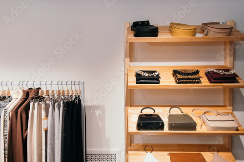 Collection of bags and clothes in fashion boutique
