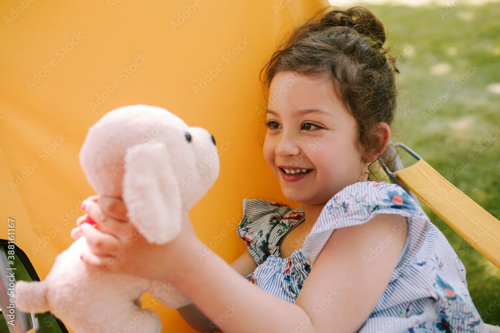 Little girl with her toy Little girl with her toy