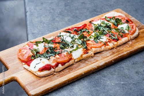 flatbread pizza on a table photo