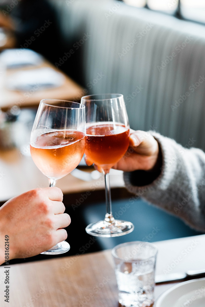 person holding a glass of wine person holding a glass of wine