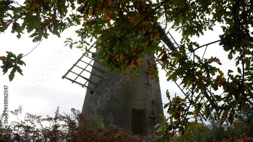 Bidston hill vintage countryside windmill flour mill English landmark right dolly through wilderness photo