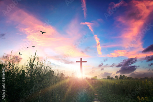 Canvas Print Easter concept: Concept : cross on sunset sky background