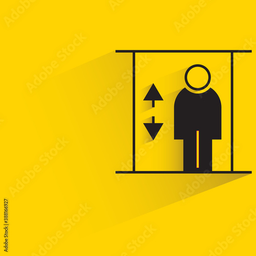 elevator and people symbol with drop shadow on yellow background