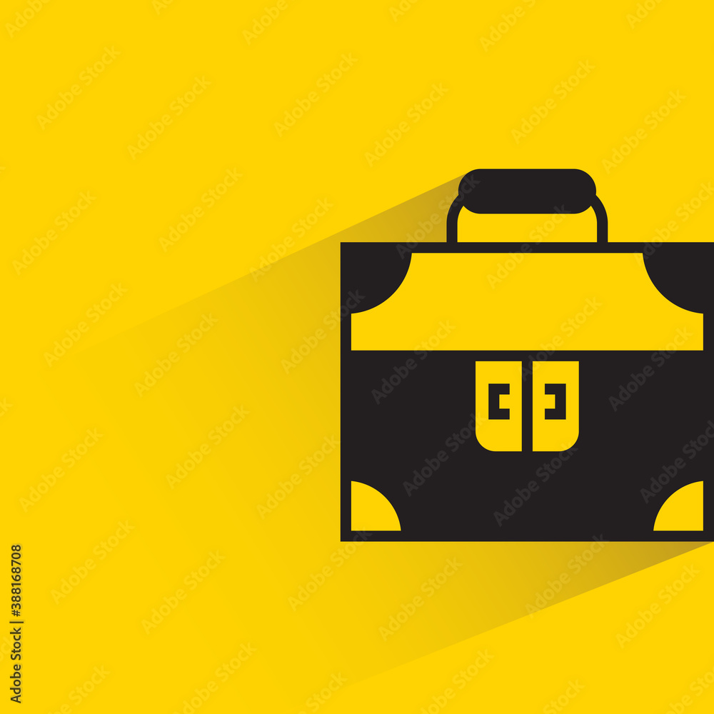 briefcase with drop shadow on yellow background briefcase with drop shadow on yellow background