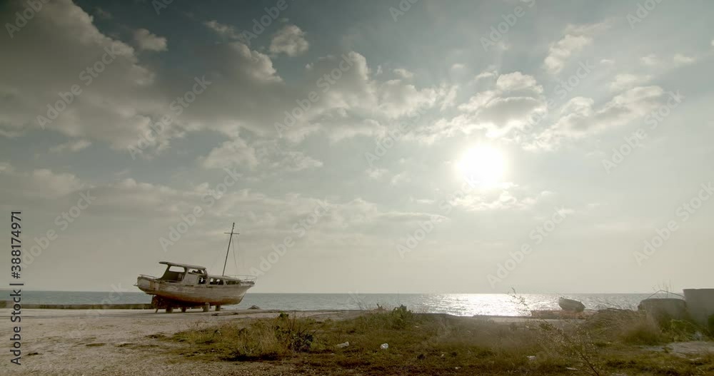 shipwreck beached on sand near sea sunny day , old ship ruins abandoned vintage boat old memories moody cinematic shot shipwreck beached on sand near sea sunny day , old ship ruins abandoned vintage boat old memories moody cinematic shot