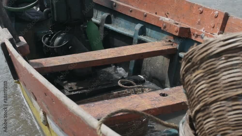 small Indian fishing boat full of water rocking in the sea waves slow motion small Indian fishing boat full of water rocking in the sea waves slow motion