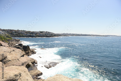 Australian waves with the blue water and was on the sunny day in Sydney, Australia