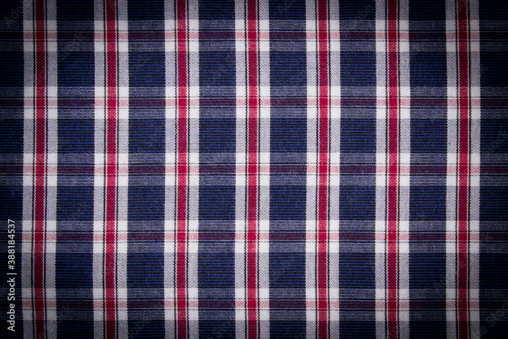 Colorful checkered shirt as background texture Colorful checkered shirt as background texture