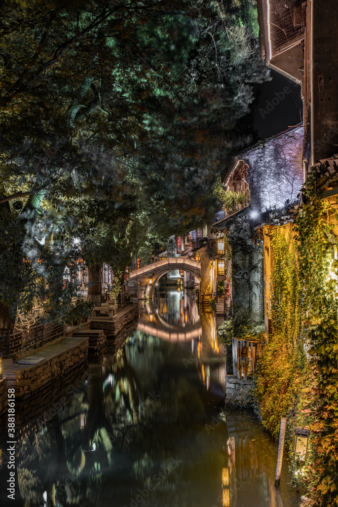 Night view of the river and architecture in Zhouzhuang, an ancient Chinese village in Jiangsu province, China. Night view of the river and architecture in Zhouzhuang, an ancient Chinese village in Jiangsu province, China.