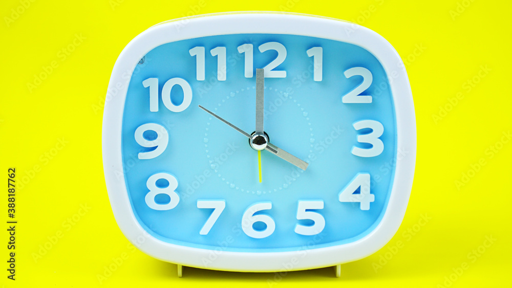 Alarm clock isolated on yellows background. Alarm clock isolated on yellows background.
