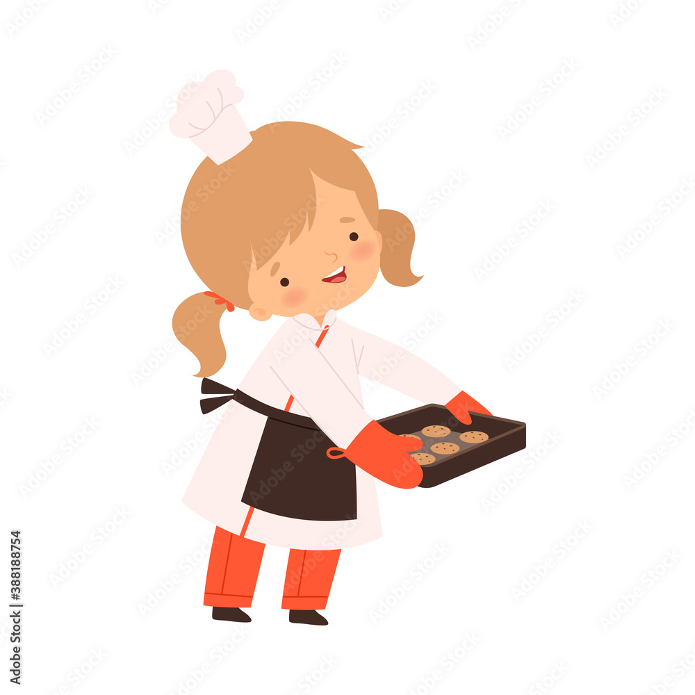 Cute Boy Holding Baking Cookies, Cute Little Chef Character in Uniform Cooking in the Kitchen Cartoon Style Vector Illustration