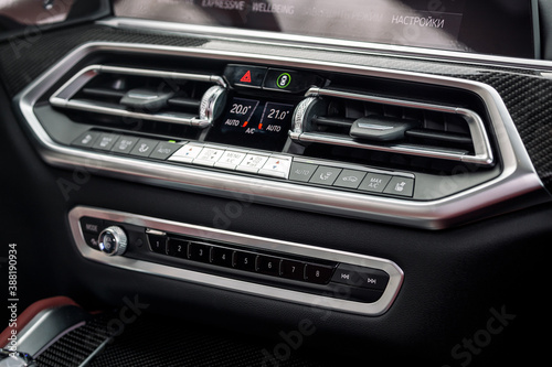 close up of  separate climate control in an expensive car. Conditioner and air flow control in a modern car © Виталий Сова