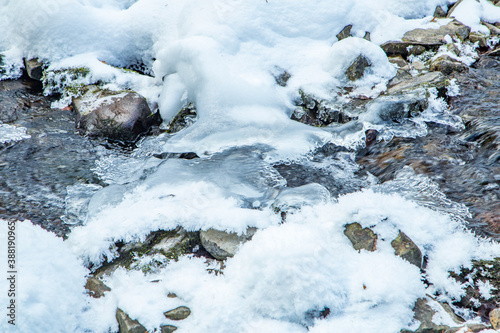 stream stuck in the snow. © robertuzhbt89