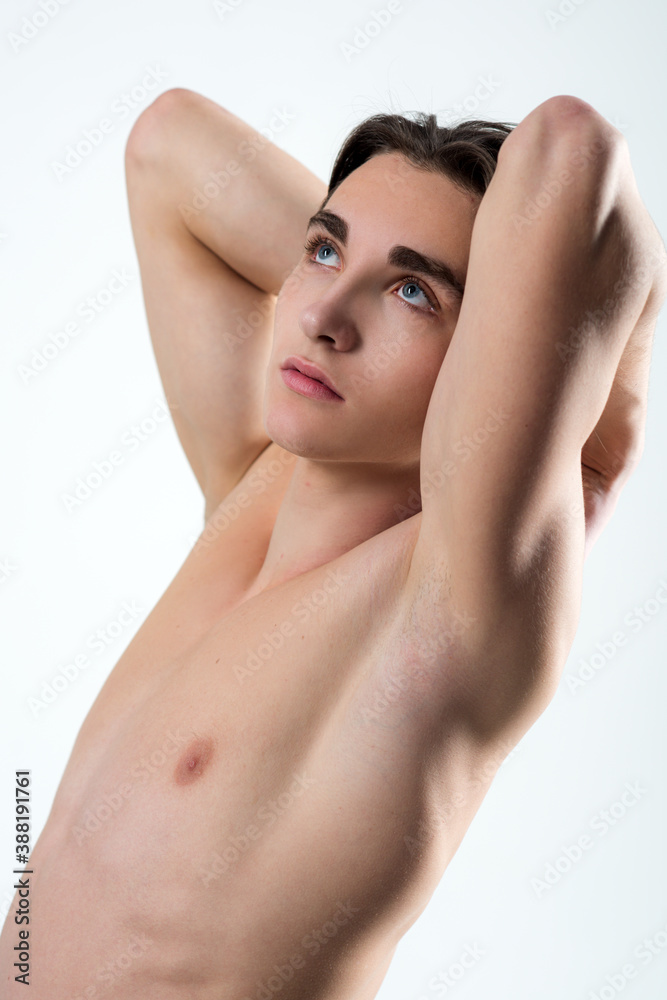 Muscular young guy with a bare torso. Muscular young guy with a bare torso.
