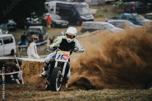 Racing motorcycle cornering on the dirt track.