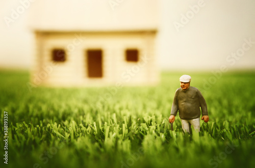 concept image of senior person walkin alone to his home