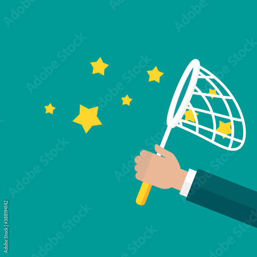 Businessman hand holds butterfly net with stars. Catch, hunt, chase symbol.