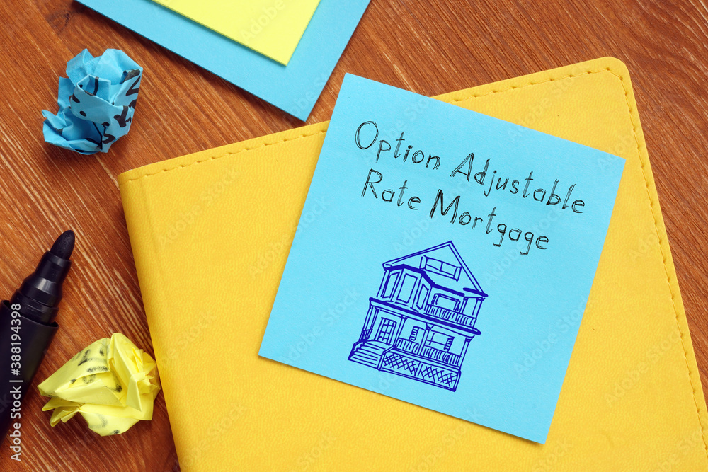 Financial concept about Option Adjustable Rate Mortgage with inscription on the page. Financial concept about Option Adjustable Rate Mortgage with inscription on the page.