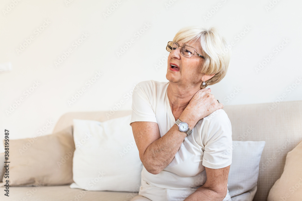 Close up of sad senior lady with neckache. Senior woman with chronic pain syndrome fibromyalgia suffering from acute neckaches. Senior woman suffering from neck pain Close up of sad senior lady with neckache. Senior woman with chronic pain syndrome fibromyalgia suffering from acute neckaches. Senior woman suffering from neck pain