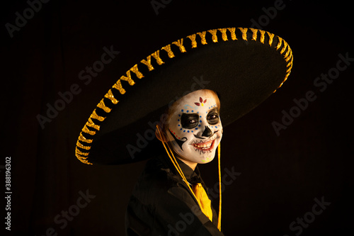 day of the dead, latin party, child disguised as a skull