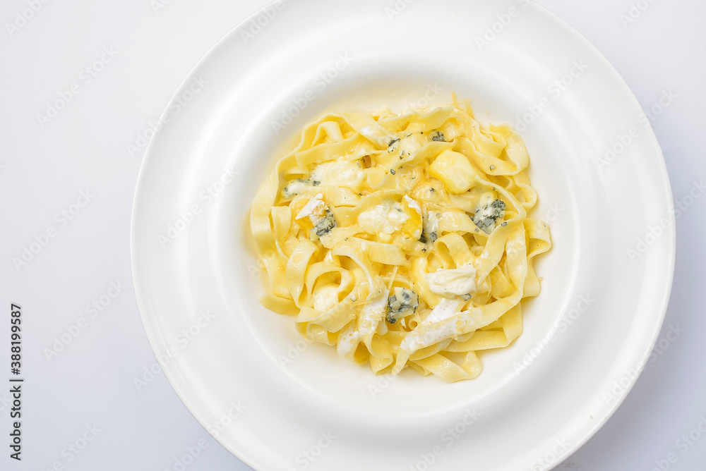 Pasta Penne with blue cheese. Traditional Italian dish pasta with cheese on top. Delicious dinner idea. Pasta Penne with blue cheese. Traditional Italian dish pasta with cheese on top. Delicious dinner idea.