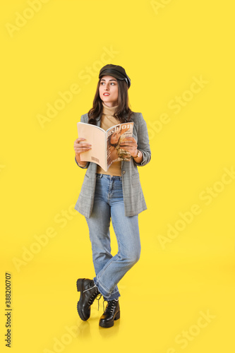 Stylish young woman in autu...