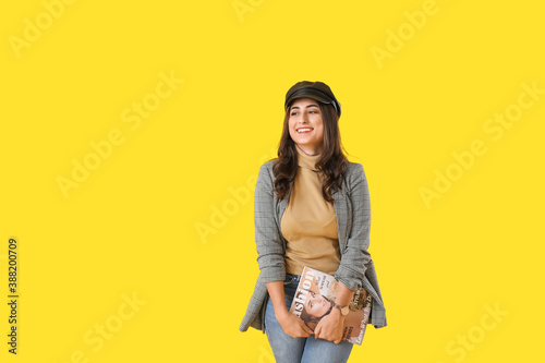 Stylish young woman in autu...