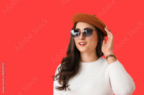 Stylish young woman in autu...