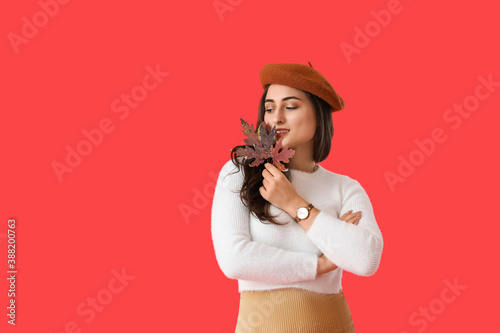 Stylish young woman with au...