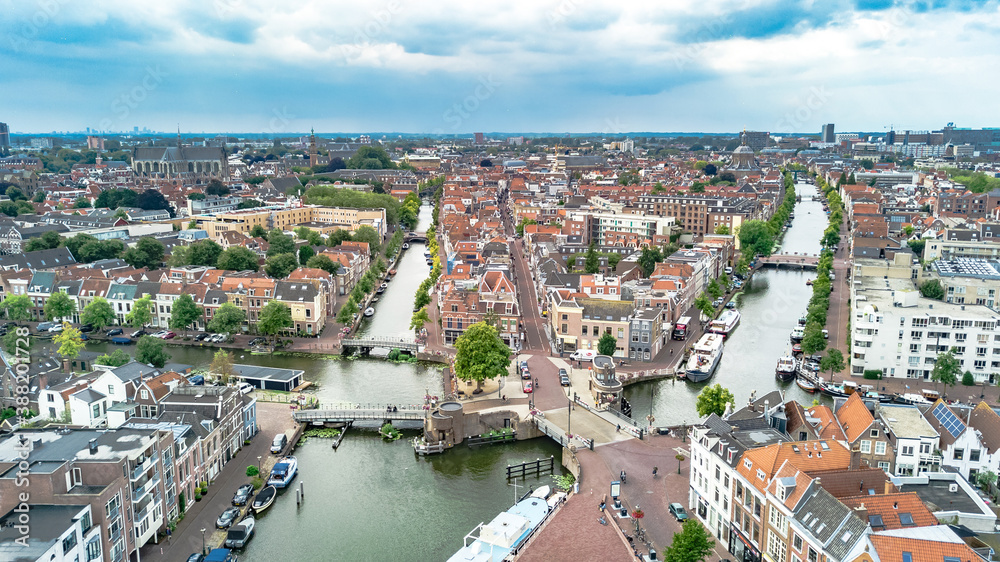 Aerial drone view of Leiden town cityscape from above, typical Dutch city skyline with canals and houses, Holland, Netherlands
