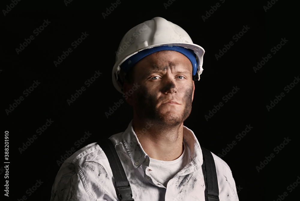 Miner man on dark background Miner man on dark background