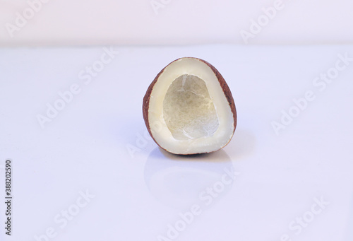 raw coconut without water on white background 1