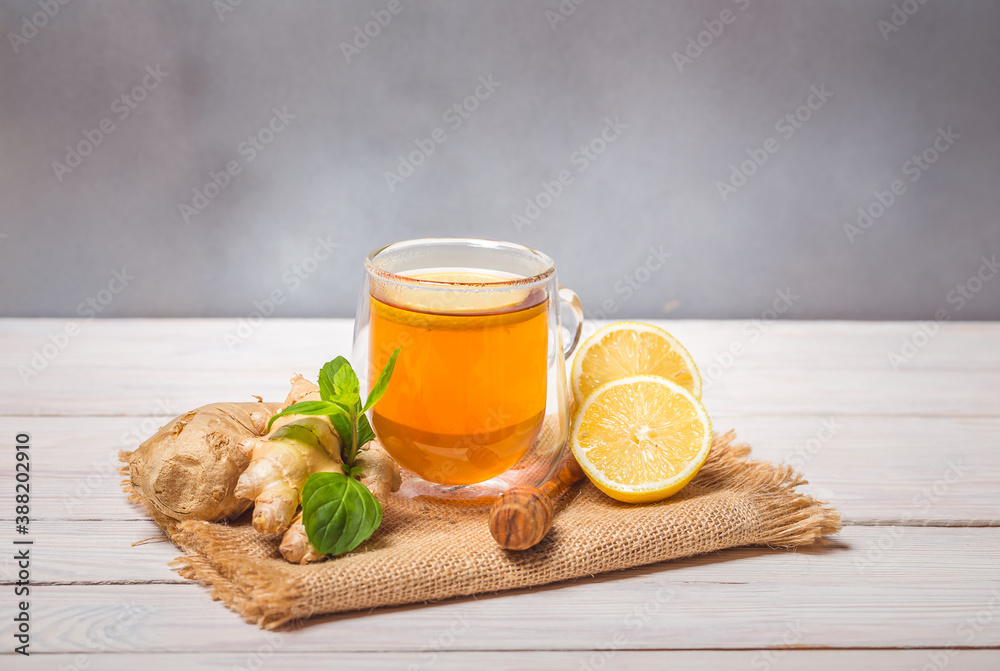 Ginger tea with mint, lemon and honey. Homemade warming tea for colds and flu. Ginger tea with mint, lemon and honey. Homemade warming tea for colds and flu.