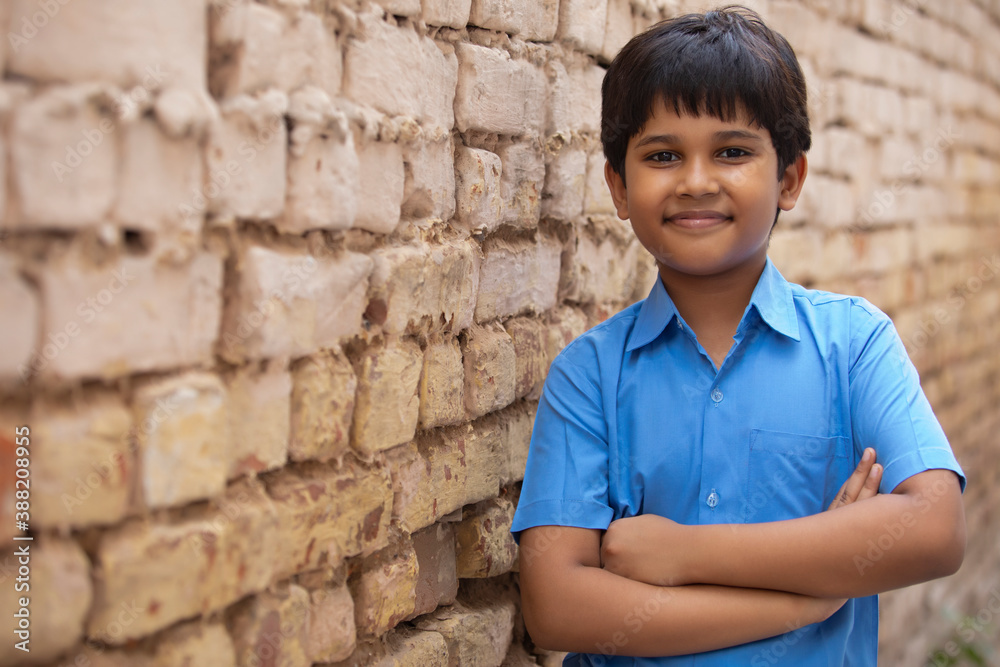 PORTRAIT OF A SMALL RURAL BOY LOOKING AT CAMERA AND SMILING
PORTRAIT OF A SMALL RURAL BOY LOOKING AT CAMERA AND SMILING