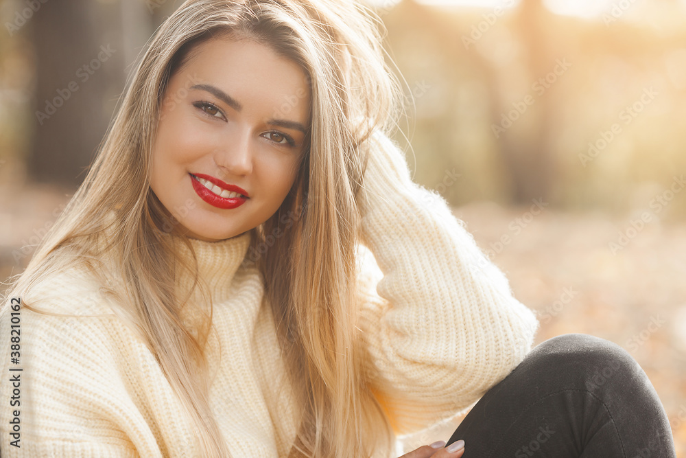 Naklejka premium Classic woman portrait on autumn background