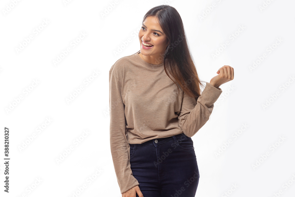 Beautiful woman looking sideways and smiling Beautiful woman looking sideways and smiling